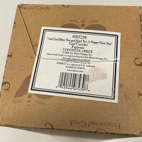 Jim Shore And God Bless You and Send You a Happy New Year Caroler 2006 - Picture 7 of 7